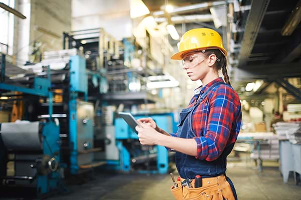 Factory Worker Using a Tablet